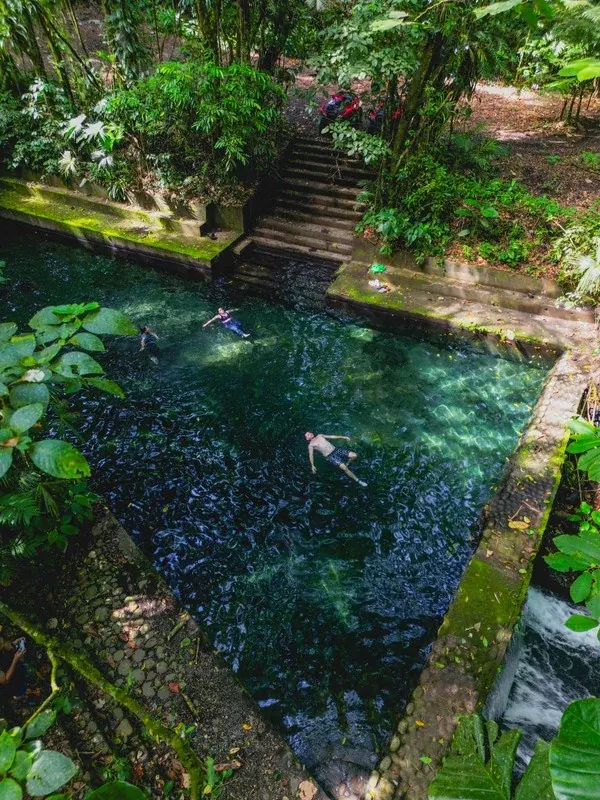 Natural thermomineral pool surrounded by forest at Super Quads