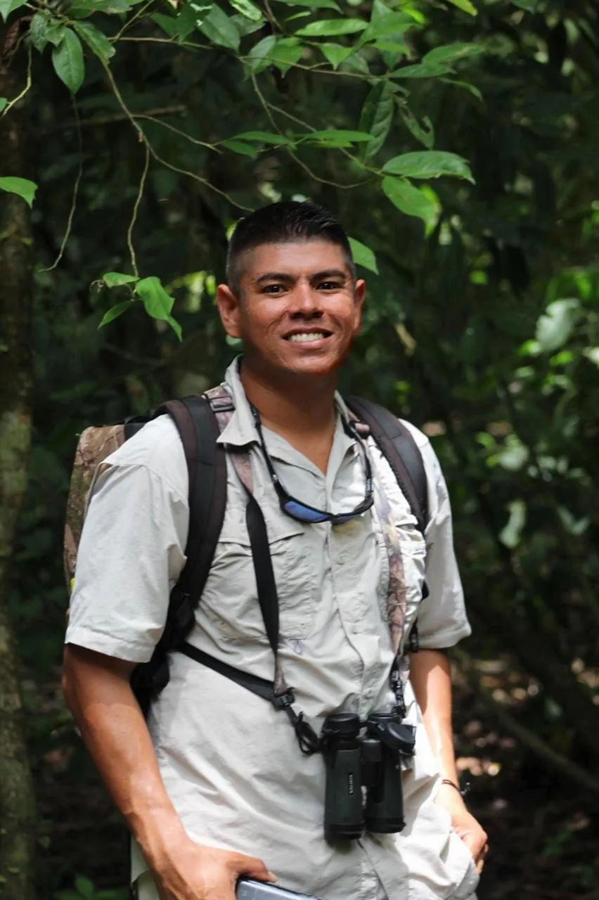 César Moraga guiding in tropical forest