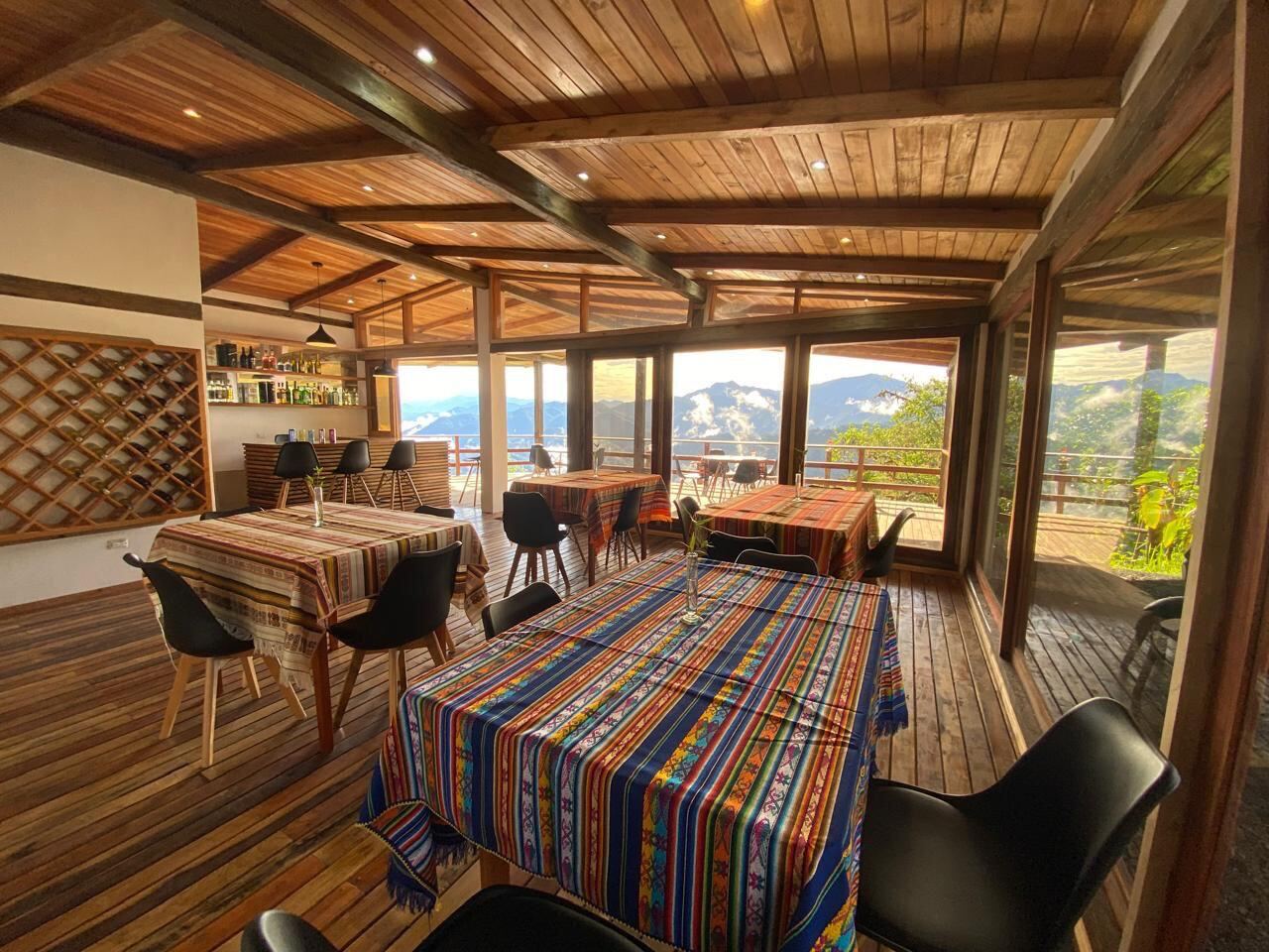 Panoramic main lodge interior at Guaycapi Lodge