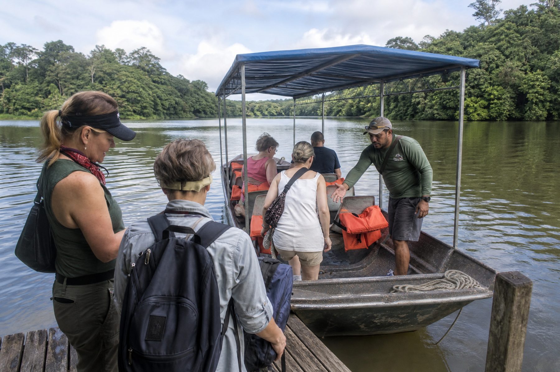 Travellers boarding the boat at the dock
