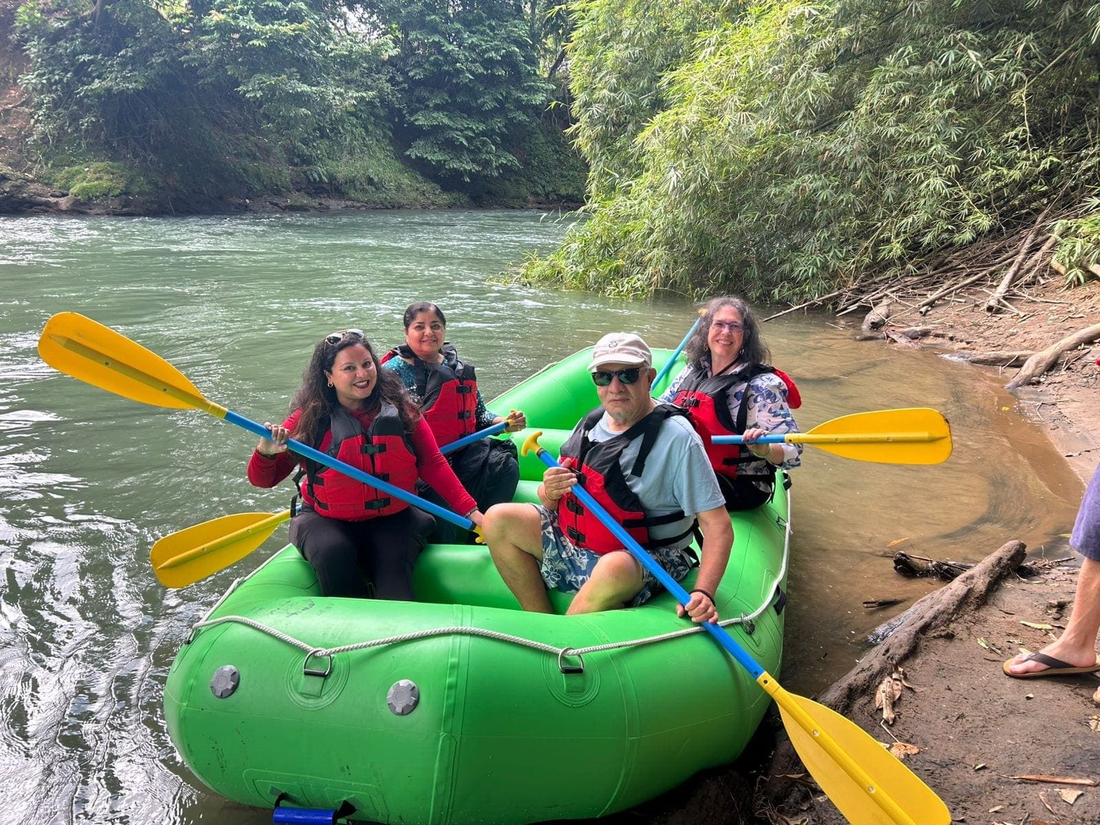 Family floating down the Peñas Blancas River, Arenal safari